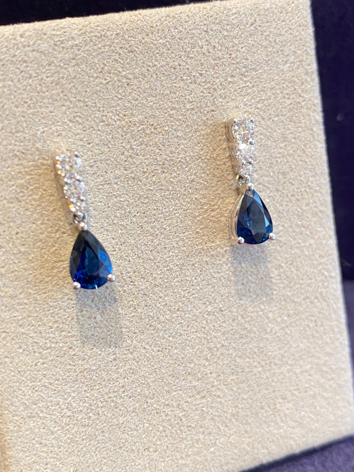 White gold, diamond & pear-shaped sapphire earrings