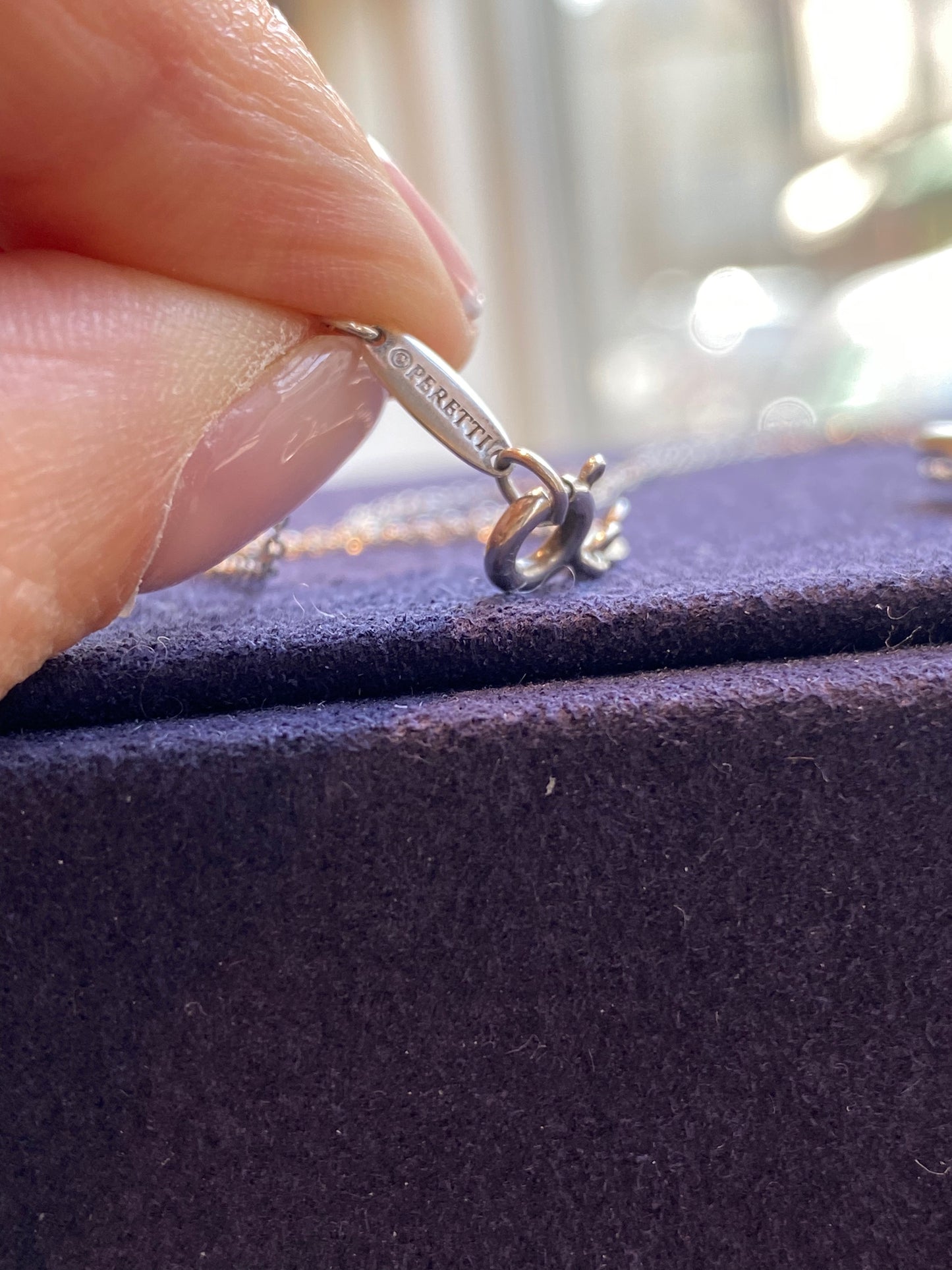 Tiffany & Co, par Elsa Peretti (1940-2021), Collier  en argent "Open heart"